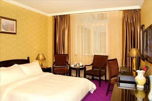 Dalian Guomao Jiari Hotel Zimmer foto